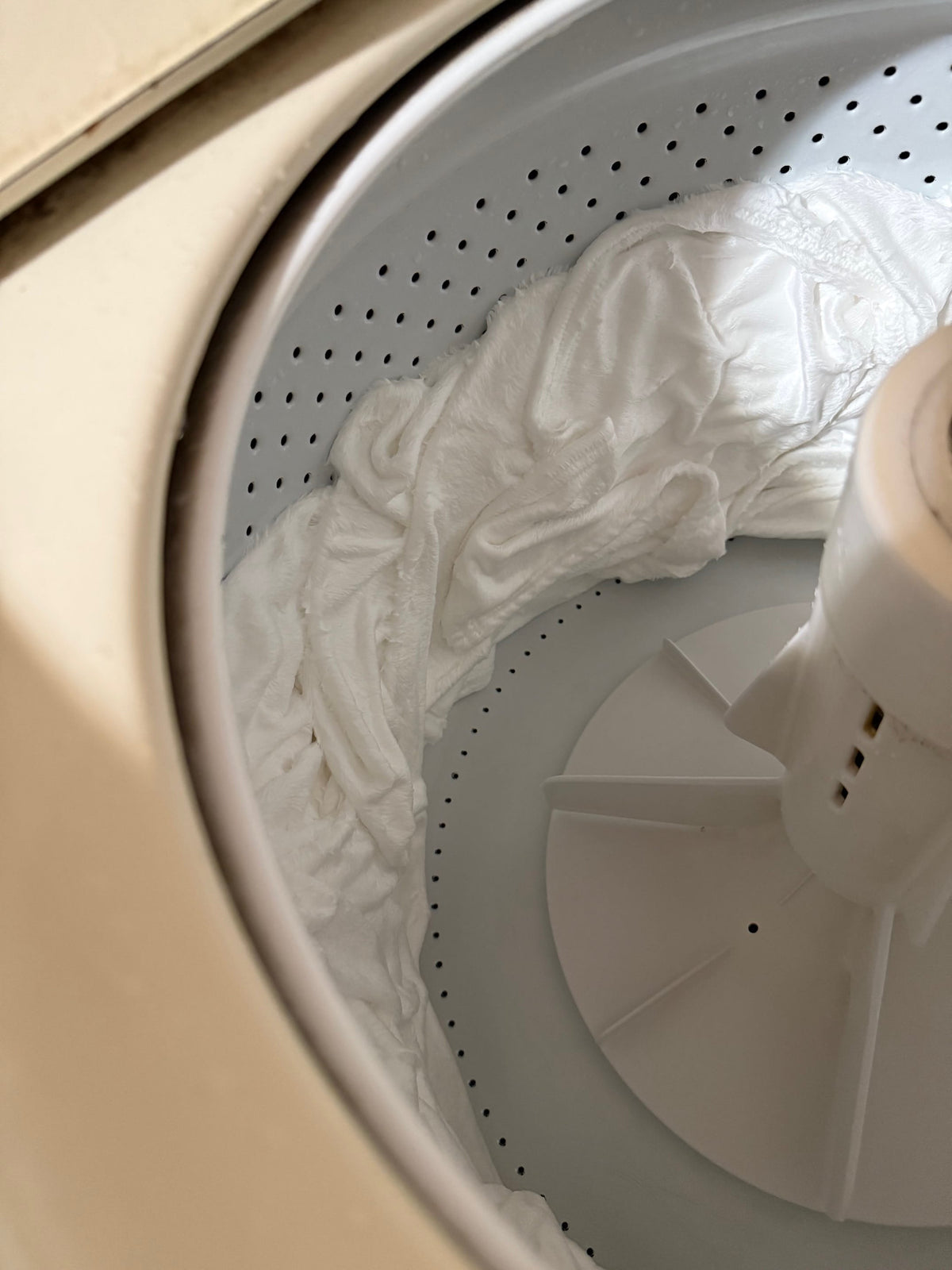 Blanket inside a washing machine drum
