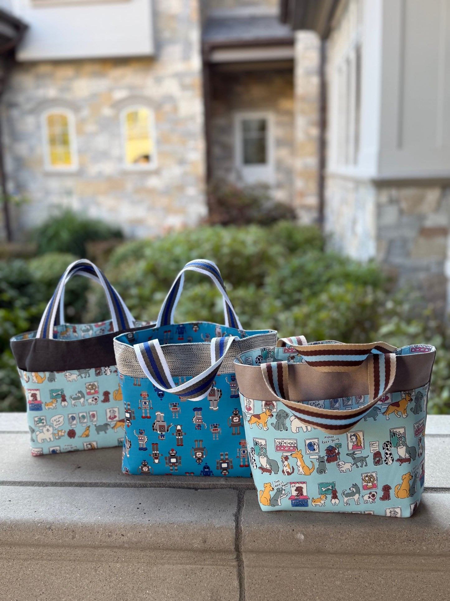 Display of three variants of the Children's Scripture Bag