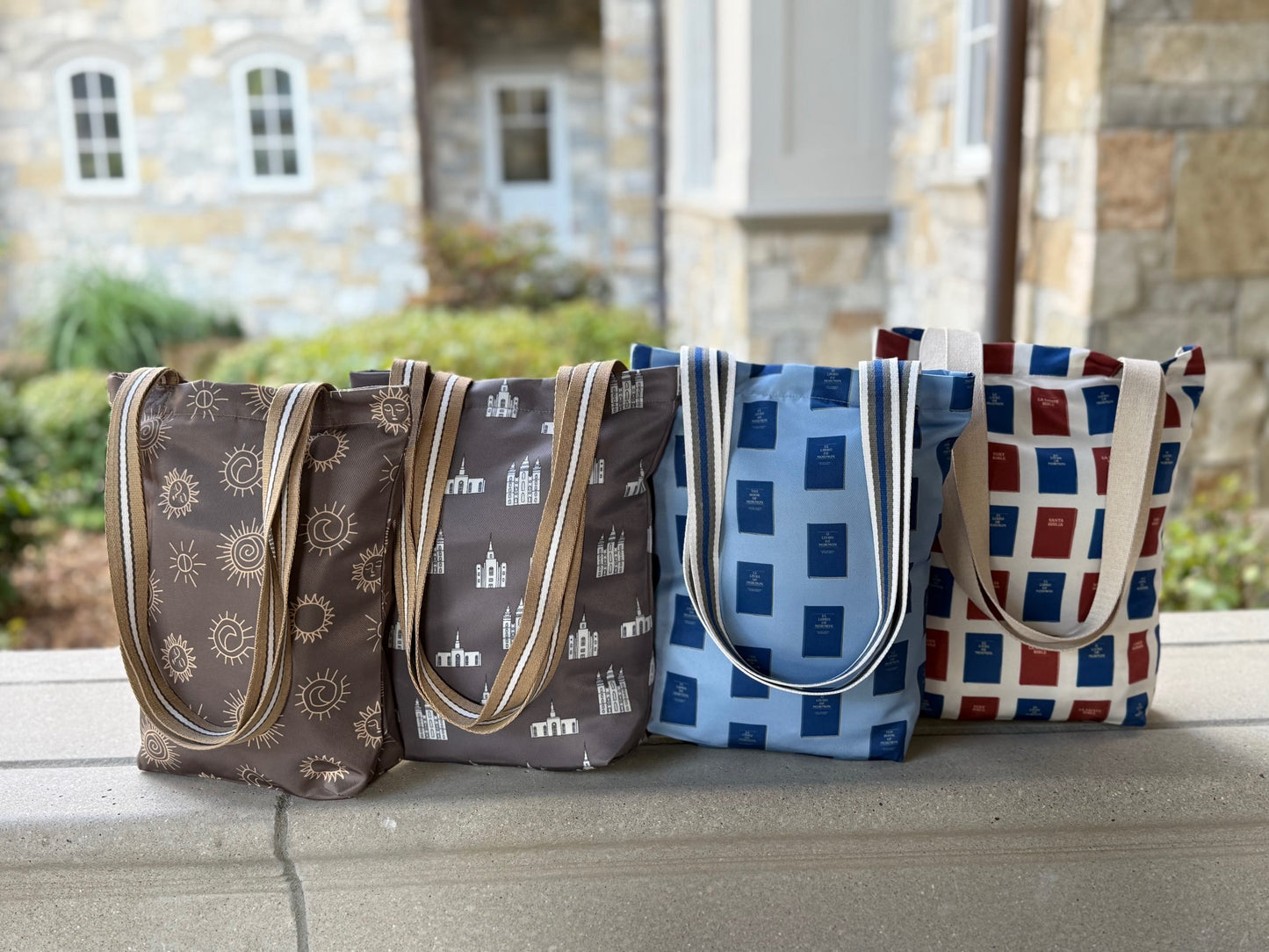 Display of the four variants of the Everyday Scripture and Little Church Tote
