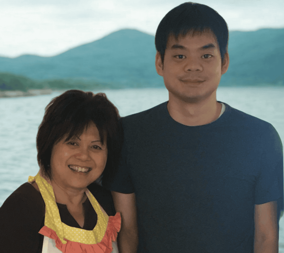 Philip and Isabella with lake and mountains background