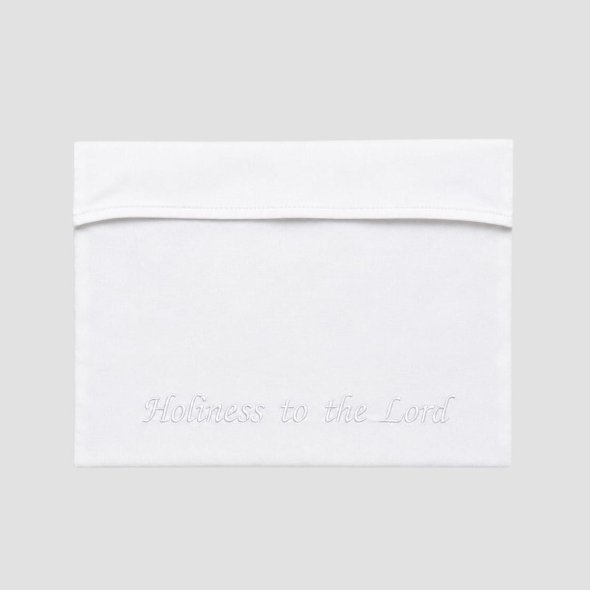 White temple envelope with the words 'Holiness to the Lord' embroidered in white on the front