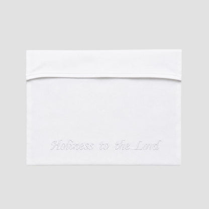 White temple envelope with the words 'Holiness to the Lord' embroidered in white on the front