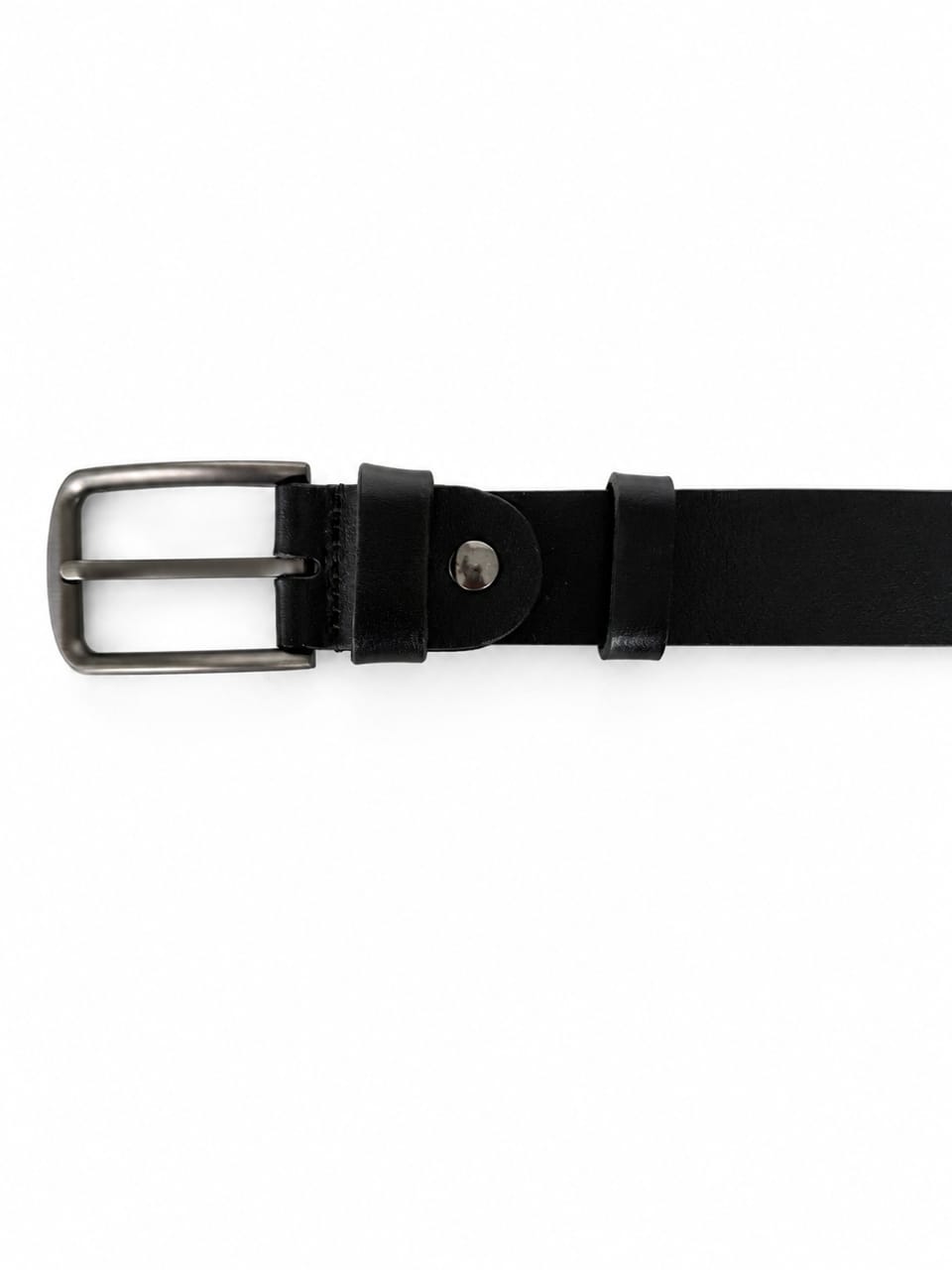 Close-up of a black leather belt with a silver metal buckle on a white background