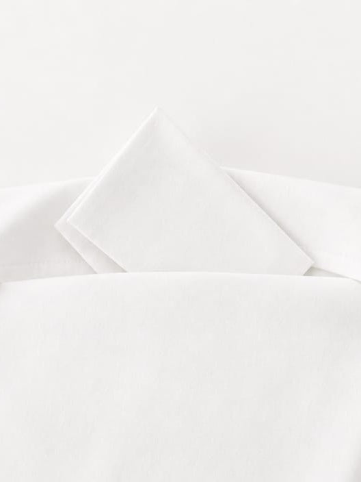 White cotton temple pouch tucked inside inner pocket of temple envelope