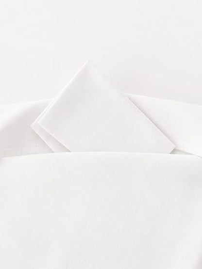 White cotton temple pouch tucked inside inner pocket of temple envelope