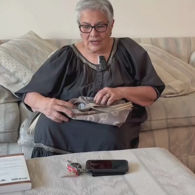 Woman reviewing the Everyday Scripture and Little Church Tote
