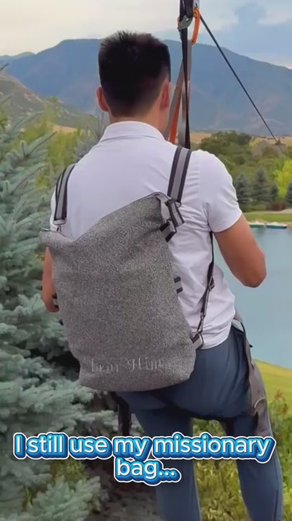 A voiceover explains all of the great features of a convertible shoulder bag while a slideshow of individuals using the bag plays.